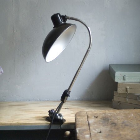 Black Helion lamp with wide shade and clamping base